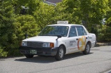 小型タクシー：オレンジのマークが目印です